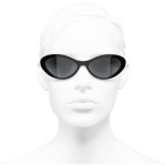 oval sunglasses black acetate acetate packshot worn front axs  scaled
