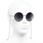 round sunglasses gold metal metal packshot worn   axl   scaled